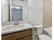 Bathroom featuring single sink with modern countertops, and a tiled shower at 4432 Sw 84Th Street Rd, Ocala, FL 34476