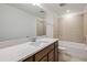 Bathroom featuring double sinks with modern countertops, a soaking tub and tiled shower at 4432 Sw 84Th Street Rd, Ocala, FL 34476
