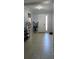 Bright entryway with a white door, tile flooring, and neutral paint at 1360 Se 63Rd Court Rd, Ocala, FL 34472