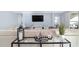 Inviting living room with comfortable seating and a large television at 1360 Se 63Rd Court Rd, Ocala, FL 34472