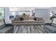 Open-concept living area with a large sofa and plenty of seating at 1360 Se 63Rd Court Rd, Ocala, FL 34472