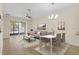 Comfortable living room with modern decor, neutral colors, and ample space for entertaining at 3825 Quaint Ln # C, Clermont, FL 34711