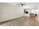 Inviting living space boasting tile floors, a breakfast bar, and views of the kitchen and dining area at 3825 Quaint Ln # C, Clermont, FL 34711