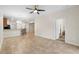 A spacious living room is showcasing an open floor plan at 3825 Quaint Ln # C, Clermont, FL 34711
