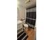 Bathroom with a shower, toilet and white vanity at 1640 Juno Trl # 202E, Astor, FL 32102