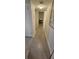 Clean and bright hallway with tile flooring at 1640 Juno Trl # 202E, Astor, FL 32102