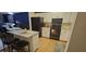 Modern kitchen with granite island and stainless steel appliances at 1640 Juno Trl # 202E, Astor, FL 32102