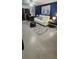 Spacious living room with comfortable seating and large TV at 1640 Juno Trl # 202E, Astor, FL 32102