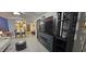 Open living room with built-in entertainment center and fireplace at 1640 Juno Trl # 202E, Astor, FL 32102