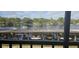 Scenic waterfront view with boats and lush trees at 1640 Juno Trl # 202E, Astor, FL 32102