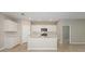 Modern kitchen featuring island, stainless steel appliances, and white cabinets at 8323 Sw 52Nd Lane Rd, Ocala, FL 34481