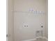 Laundry closet with shelving and hookups for washer/dryer at 8323 Sw 52Nd Lane Rd, Ocala, FL 34481
