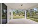 Covered patio overlooking a fenced backyard at 8323 Sw 52Nd Lane Rd, Ocala, FL 34481