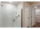 Bathroom features large glass-enclosed shower with tiled walls at 6218 Sw 95Th Pl, Ocala, FL 34476