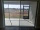 Screened-in patio provides views of the community lawn and outdoor space at 6218 Sw 95Th Pl, Ocala, FL 34476