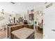 Spacious kitchen with wooden cabinets, a pantry door, and a large island, ideal for meal preparation and gathering at 2644 W 75Th Blvd, Bushnell, FL 33513