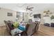 Comfortable living room with plush seating, fireplace, and a ceiling fan for added comfort at 2644 W 75Th Blvd, Bushnell, FL 33513