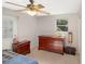 Bedroom with a dresser, nightstand, and window with blinds at 1284 Vanderbilt Dr, Ormond Beach, FL 32174