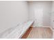 Laundry room area with counter space and wood-look flooring at 6855 Mossy Oak Ln, Lakeland, FL 33810