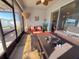 Inviting screened patio with cozy seating arrangements for relaxing outdoors at 6855 Mossy Oak Ln, Lakeland, FL 33810