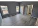 Spacious bedroom with gray walls and wood-look flooring at 13898 Sw 32Nd Ter, Ocala, FL 34473