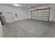 Spacious garage with an overhead door and concrete flooring at 13898 Sw 32Nd Ter, Ocala, FL 34473