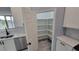 Walk-in pantry with ample shelving for storage at 13898 Sw 32Nd Ter, Ocala, FL 34473