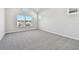 Spacious bedroom with large window and views of the neighborhood at 3007 Mirage Pl, St Cloud, FL 34771