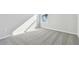 Bright bedroom features a window and neutral carpet at 3007 Mirage Pl, St Cloud, FL 34771