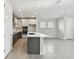 Modern kitchen with a large island, stainless steel appliances, and plenty of cabinet space at 3007 Mirage Pl, St Cloud, FL 34771
