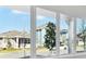 Bright living room with large windows offering neighborhood views and natural light at 3007 Mirage Pl, St Cloud, FL 34771