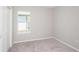 Bright bedroom with carpet flooring and neutral walls at 5429 Sw 85Th Avenue Rd, Ocala, FL 34481