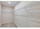 Walk-in closet with carpet and wire shelving for maximum storage and organization at 5429 Sw 85Th Avenue Rd, Ocala, FL 34481