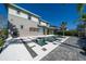 Modern geometric pool and spa with a spacious patio area at 9406 Dugard Ct, Orlando, FL 32827