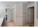 Bright bathroom with a double sink vanity, tile flooring and neutral wall colors at 4995 County Road 121D, Wildwood, FL 34785