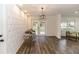 Bright living room featuring wood floors and French doors at 1309 Buccaneer Ave, Deltona, FL 32725