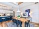 Bright dining room with wood table and white brick feature wall at 6019 Sw 86Th Cir, Ocala, FL 34481