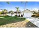 Single-story house with a two-car garage and well-maintained lawn at 2789 Sweet Springs, Deltona, FL 32738