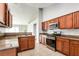 Modern kitchen featuring granite countertops and ample cabinet space at 2789 Sweet Springs, Deltona, FL 32738