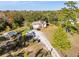 Spacious lot with ample parking, storage structures, and a home with mature trees at 2468 Fawn Run, Oviedo, FL 32765