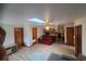 Bright living room with skylight, open floor plan, and laminate flooring at 2468 Fawn Run, Oviedo, FL 32765