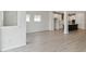 Open living space with wood flooring, featuring the kitchen and breakfast nook at 6074 Sacred Oak Ave, Mount Dora, FL 32757