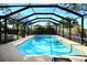 Inviting screened pool with blue water and tiled border at 4417 Orangewood W Loop, Lakeland, FL 33813