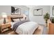 Inviting bedroom with modern decor, soft lighting, and a comfortable king-size bed at 6063 Sacred Oak Ave, Mount Dora, FL 32757