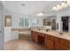 Large bathroom with double sinks, a garden tub, and a separate shower at 13438 Davenham Pt, Orlando, FL 32832