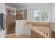 Bathroom with a shower and tub combo, and updated fixtures at 13438 Davenham Pt, Orlando, FL 32832