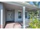 Front porch with brick flooring, white railing and gray walls at 13438 Davenham Pt, Orlando, FL 32832