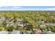 An aerial view of the property showcases lush landscaping and surrounding neighborhood at 3203 S Polk Ave, Lakeland, FL 33803