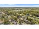 An aerial view of the property within a neighborhood with tree lined streets at 3203 S Polk Ave, Lakeland, FL 33803
