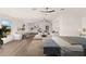 Bright, spacious main bedroom with a sitting area, natural light, and modern decor at 3203 S Polk Ave, Lakeland, FL 33803
